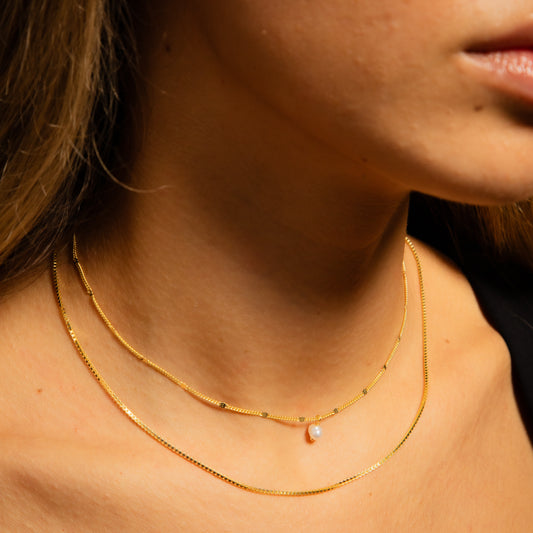 Chin and Pearl Necklace